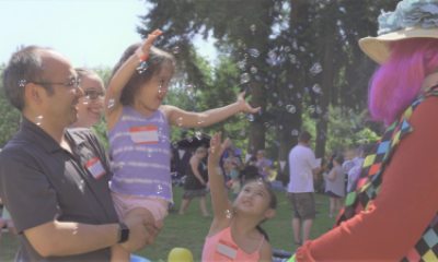 Child enjoys bubbles at NICU reunion
